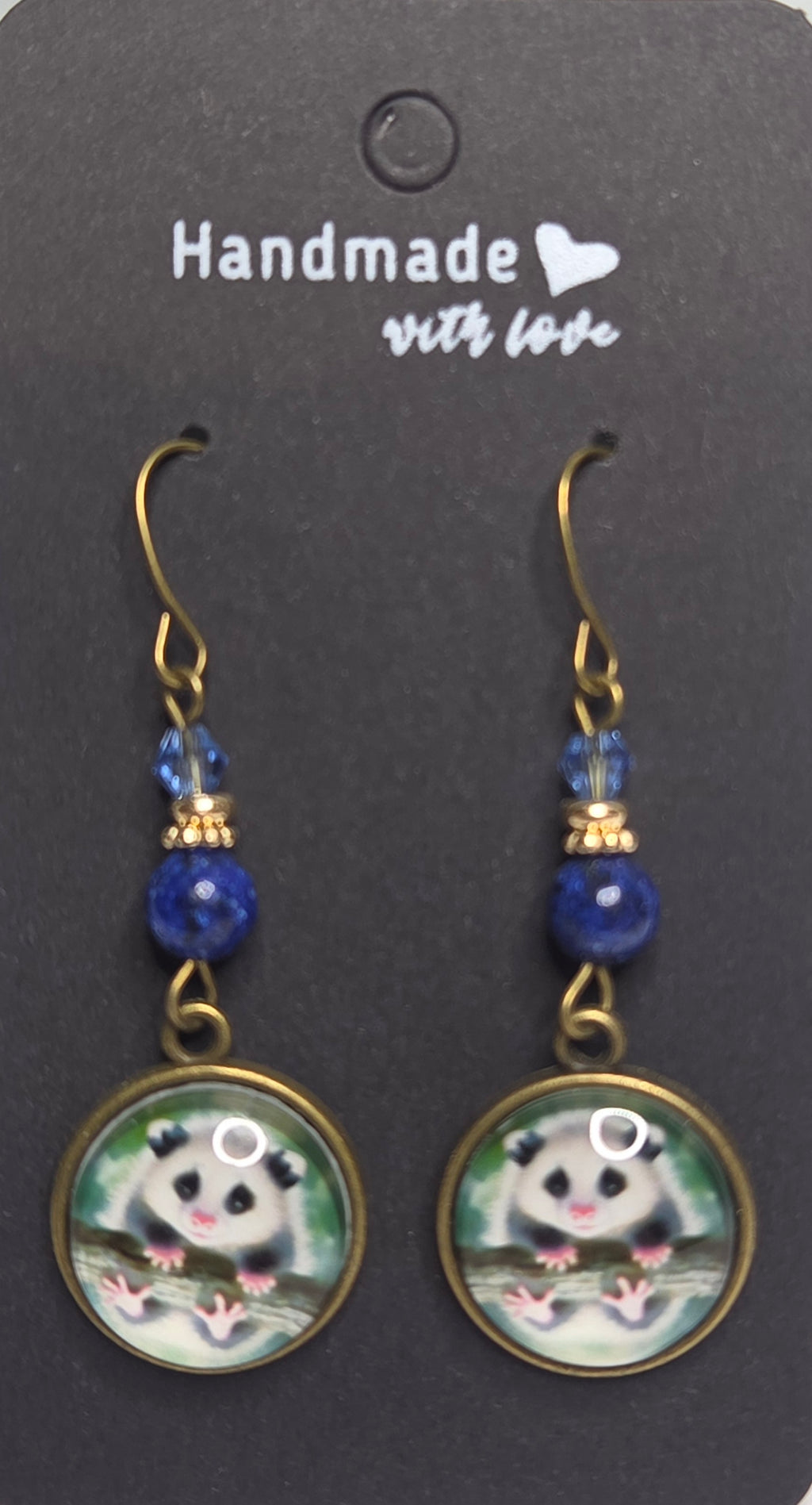 Opossum drop earrings with beads