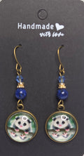 Opossum drop earrings with beads