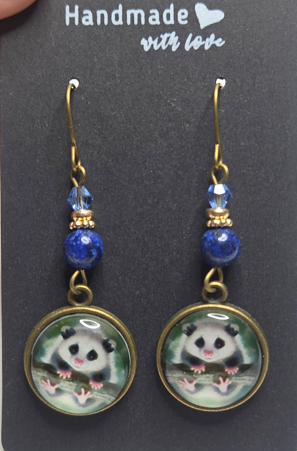 Opossum drop earrings with beads