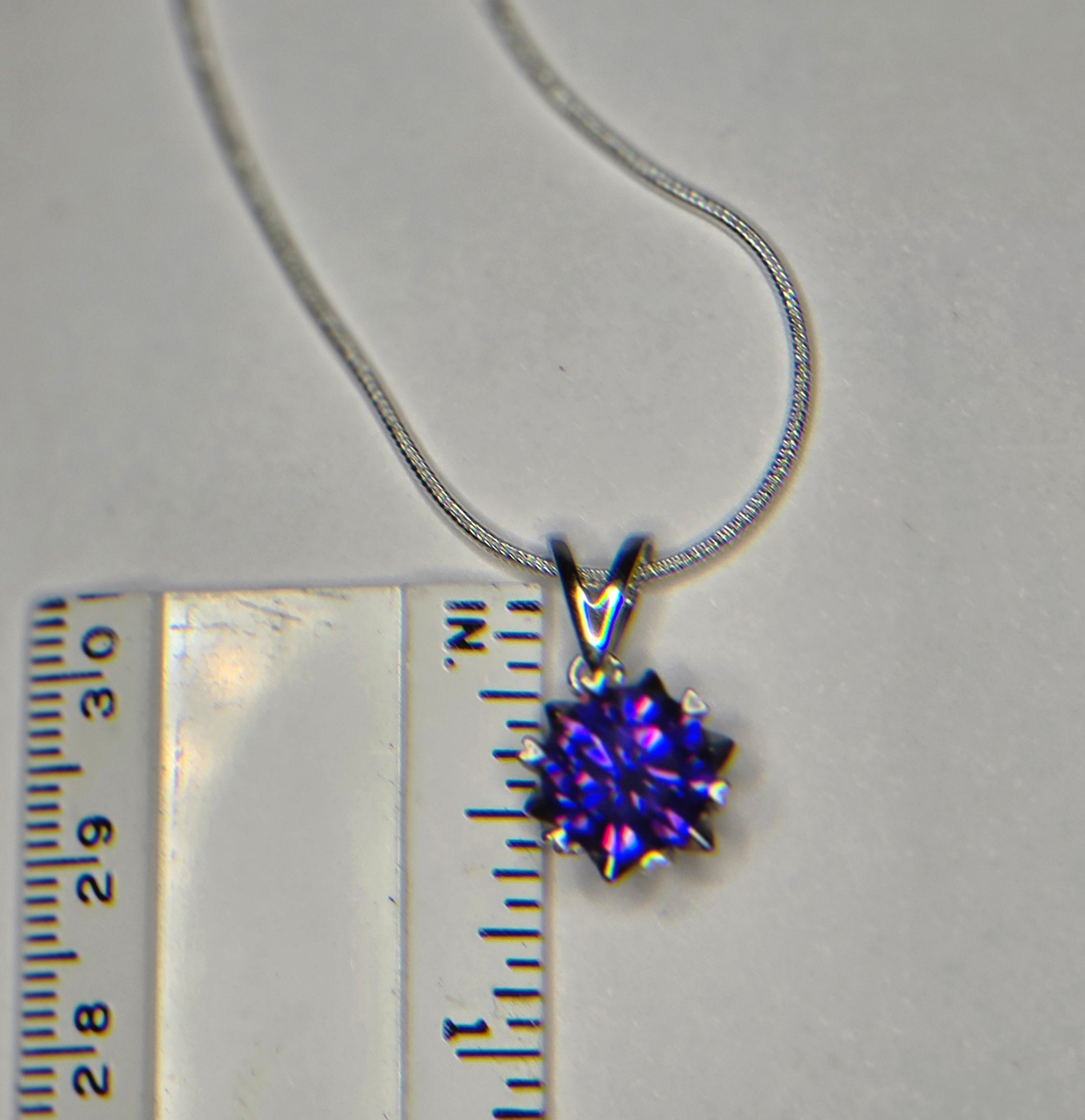2.61 carat purple synthetic amethyst solitare pendant