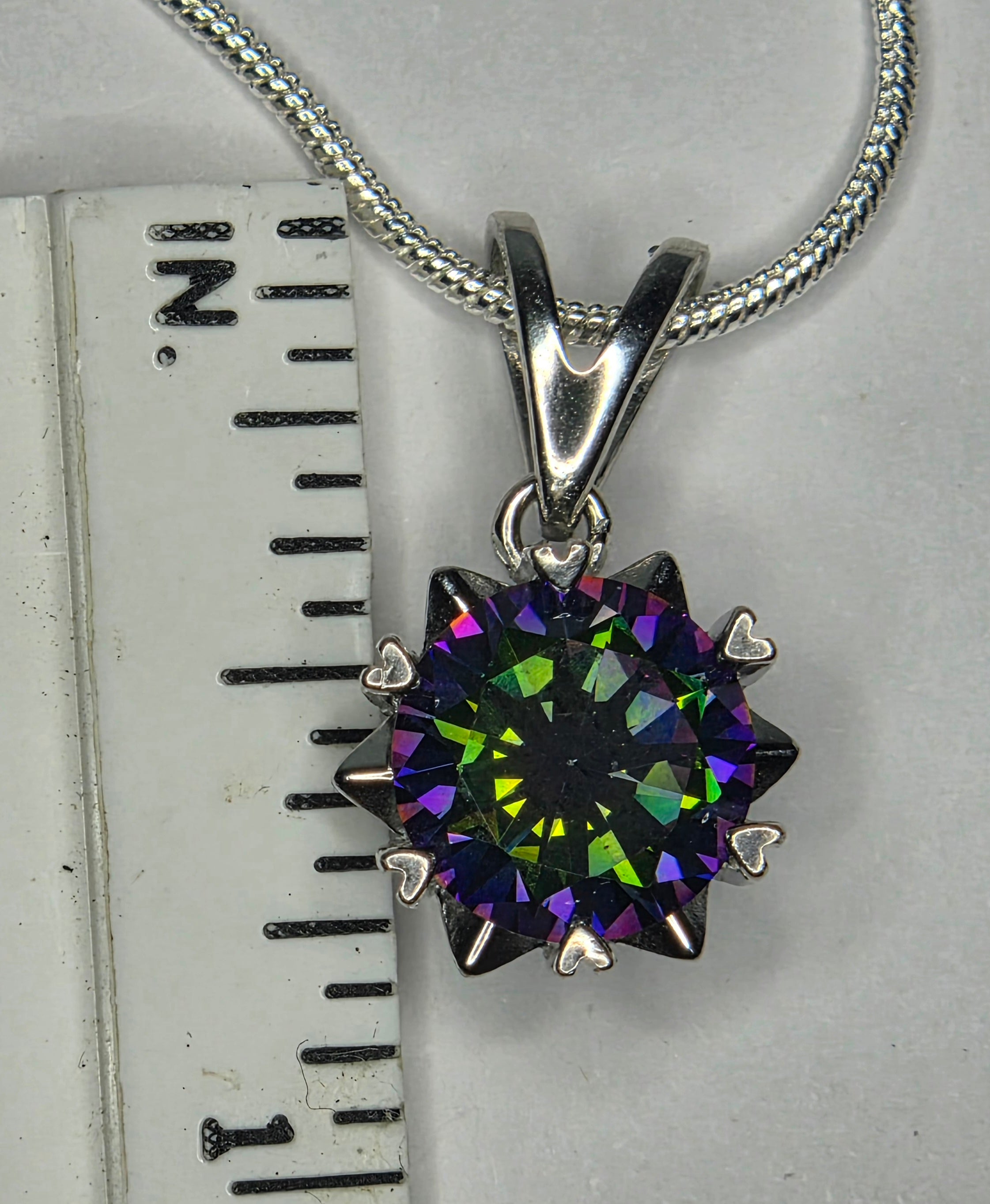 Synthetic rainbow colored moissanite pendant