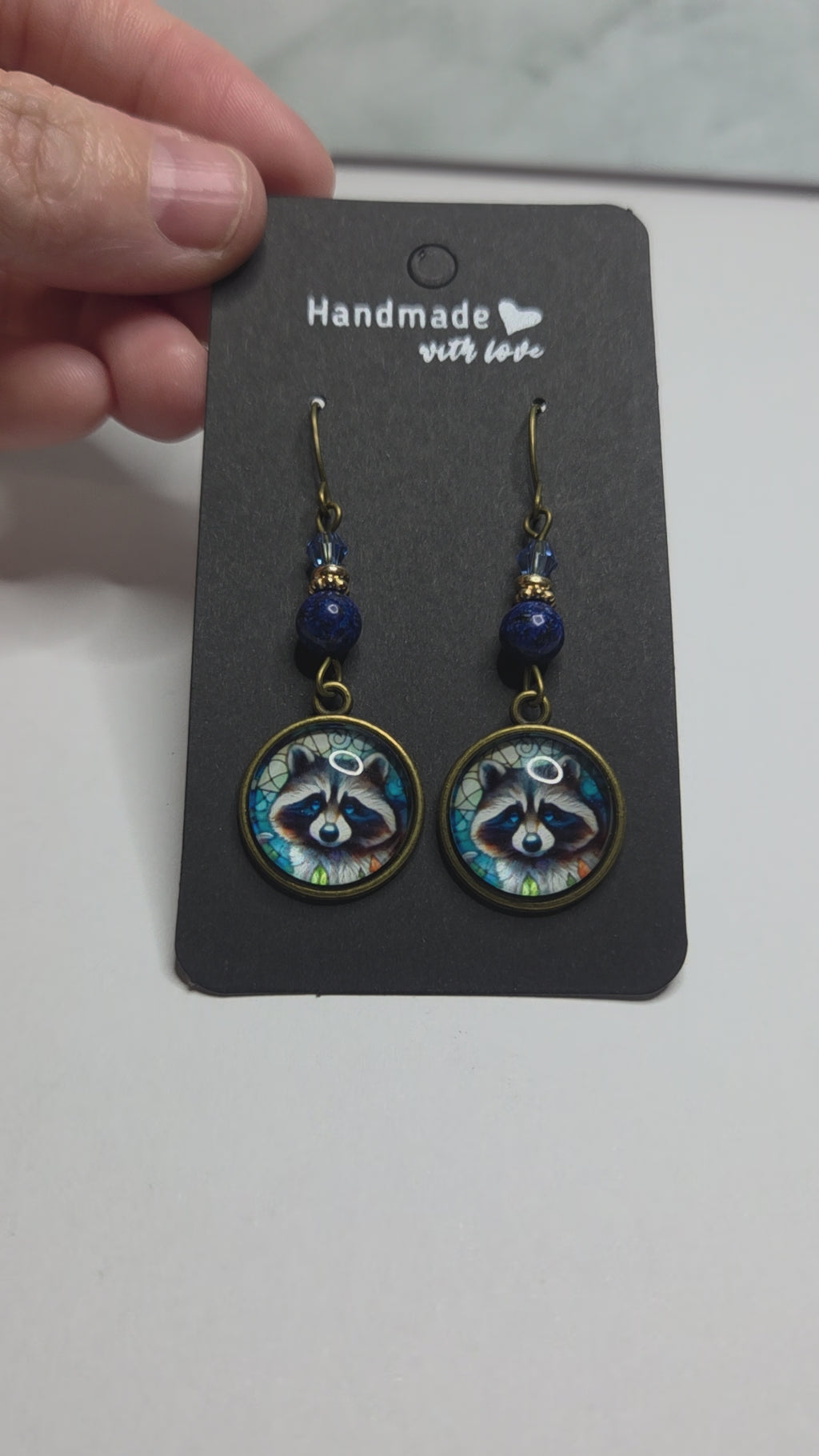 Raccoon drop earrings with beads