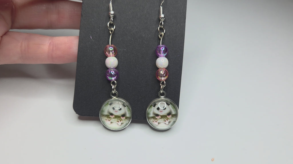 Opossum drop earrings with beads